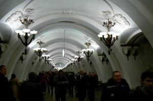 Moscow subway station with floral chandeliers.