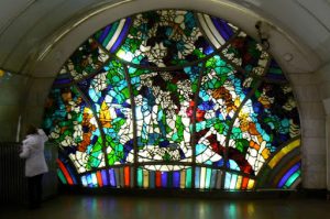 Stained glass with two figures in the center