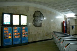 Image of Carl Marx at a subway entry hall