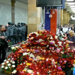 Flower memorials appeared immediately in the stations soon after train