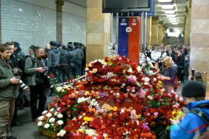 Flower memorials appeared immediately in the stations soon after train