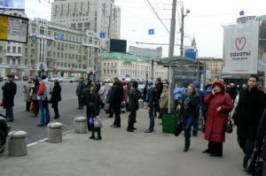 People emerging from Park Kultury station looking for alternative transportation