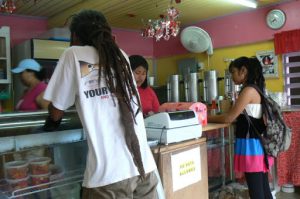 Long-haired locals buying their breakfast burritos