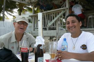 Richard and Alex at a beach bar