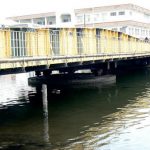 Bridge across the Belize River which divides the city