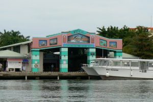 View of an arcade from water taxi to San Pedro