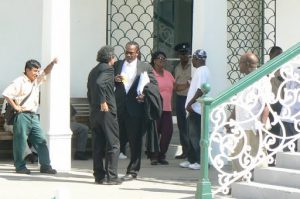 Lawyer talking outside courthouse