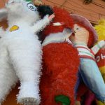 A pi????ata is a brightly-colored decoration made from either a