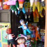 A pi????ata is a brightly-colored decoration made from either a