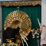 Monk during mass at Iglesia y Convento de San Francisco