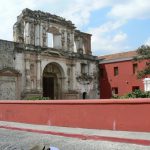 Modern church residence adjacent to antique church.