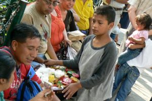 Boy selling sweets