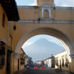 Volcano viewed through clock tower
