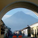 Volcano viewed through clock tower