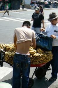 Banana vendor cooling his ribs