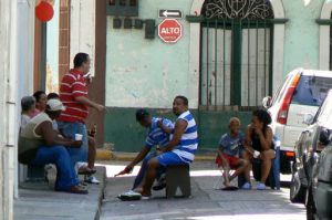 Locals chatting, smoking and drinking