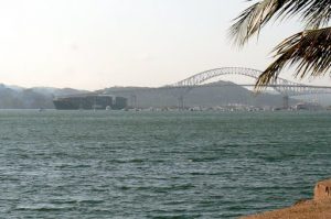 Cargo ship passing under the Bridge of the Americas