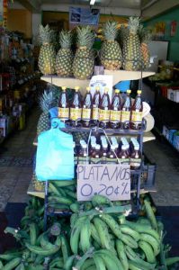Food shop with pineapples and plantains