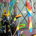 Carved tropical birds