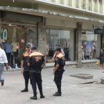 Police on pedestrian street downtown