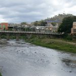 Choluteca River (polluted) with market in background