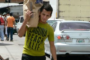 Local deliveryman with Laguna Beach T-shirt;  (GlobalGayz's home base is