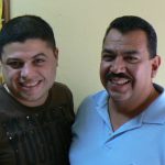 Erick Martinez Avila (right) is the monitoring and evaluation officer