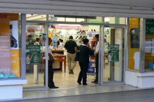 Clothing store with entry guards