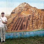 Michael in front of a Pharaoh's gambling casino mural