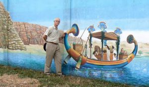 Richard in front of a Pharaoh's gambling casino mural