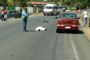 Traffic fatality on the road; bicyclist hit by taxi (no