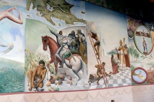 Murals in city museum depicting the Spanish conquest dominating the