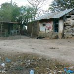 Country house, fence and trash