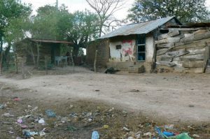 Country house, fence and trash