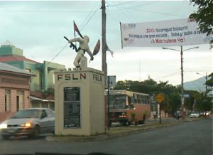 Political FSLN statue of fighter with gun and flag