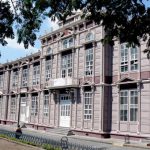 Former school building made of metal exterior plates