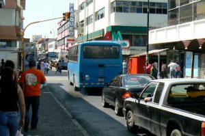 Central area crowded with traffic and commerce