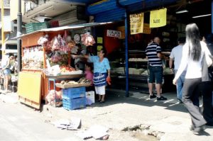 Central area crowded with traffic and commerce