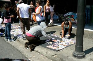 Street commerce; CDs for a dollar