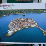 Flores is a town in Pet????n, Guatemala. The town proper