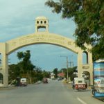 Arch to causeway over to Flores