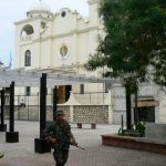 Soldiers guard the central square