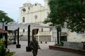 Soldiers guard the central square