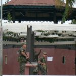 Soldiers guard the central square