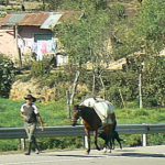 On the busy road to Lake Atitlan: many local peasant