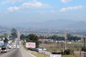 Rolling countryside on the busy road to Lake Atitlan: