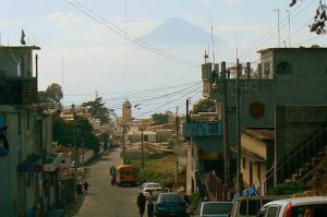 Entering the city of Panajachel on Lake Atitlan with volcano
