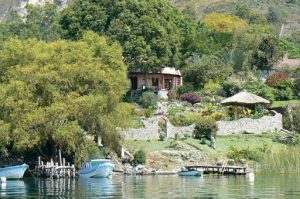 Along the shoreline of Lake Atitlan are numerous upscale homes