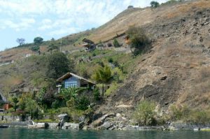 Along the shoreline of Lake Atitlan are numerous upscale homes