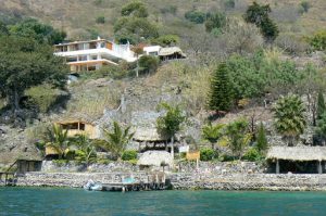 Along the shoreline of Lake Atitlan are numerous upscale homes